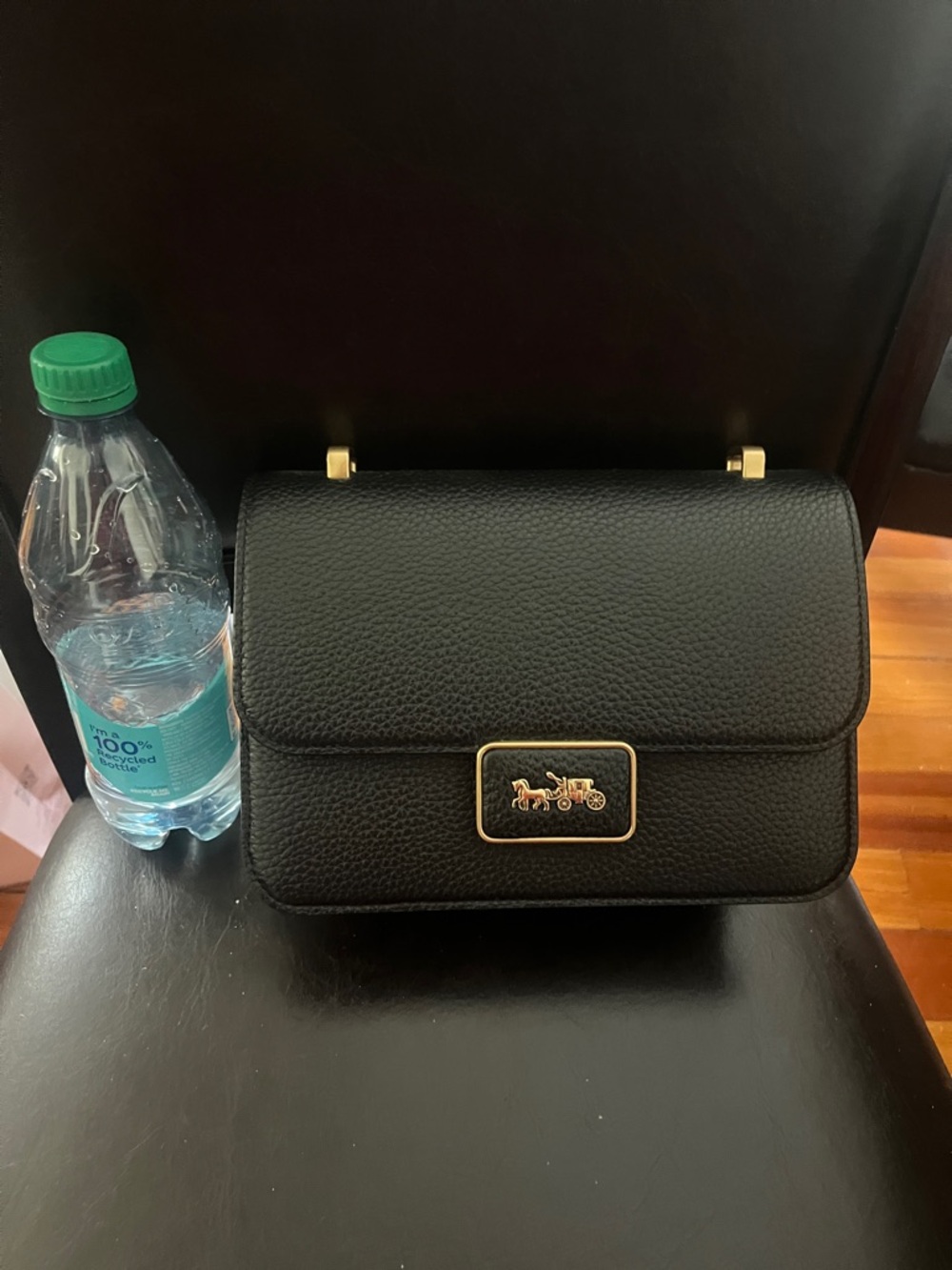 Coach Black Pebbled Leather Crossbody with Gold Horse & Carriage Plaque